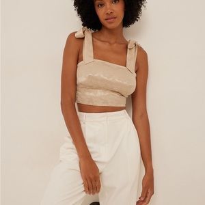 tan satin floral pattern top with tie sleeves